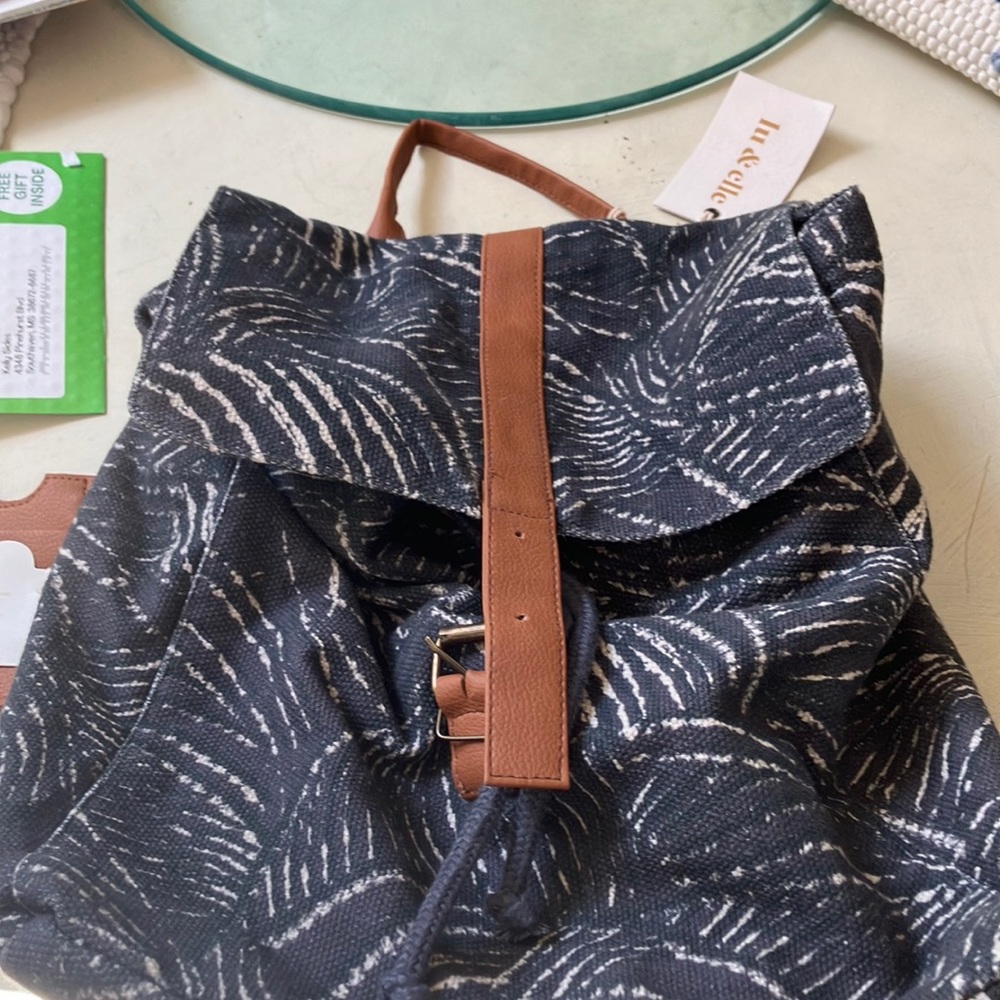 NWT Lu & Elle Backpack. Comes with matching card holder